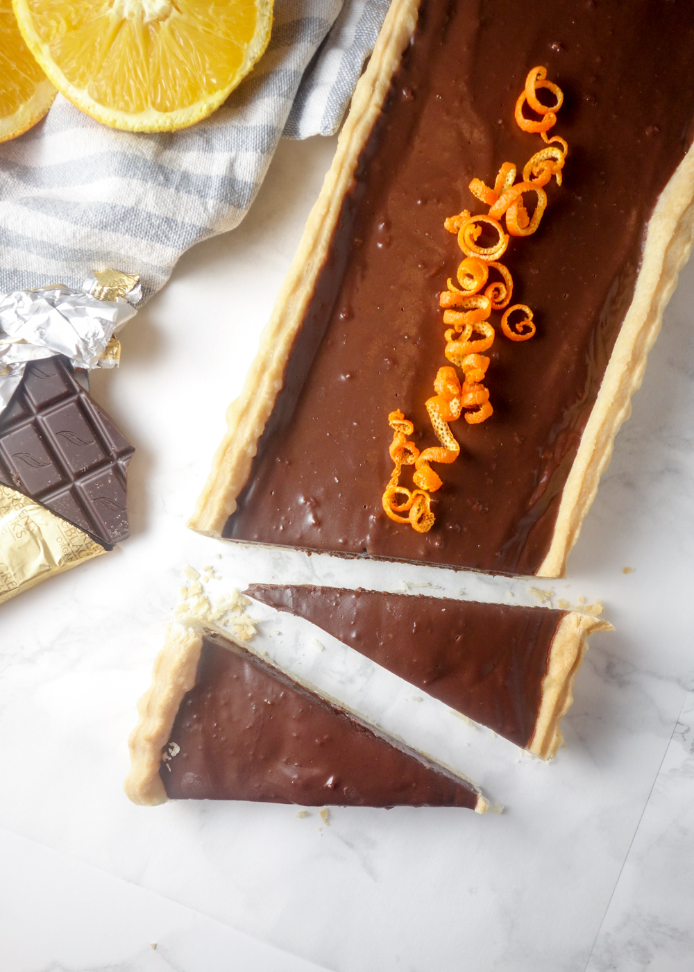 Chocolate Orange Tart: Shortcrust pastry with a light and creamy chocolate orange filling. The perfect make-ahead dessert!