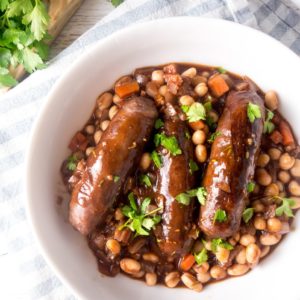 Venison Sausage Bean Casserole: A hearty, comforting recipe of venison sausages in a rich red wine gravy that only takes 20 minutes to cook.